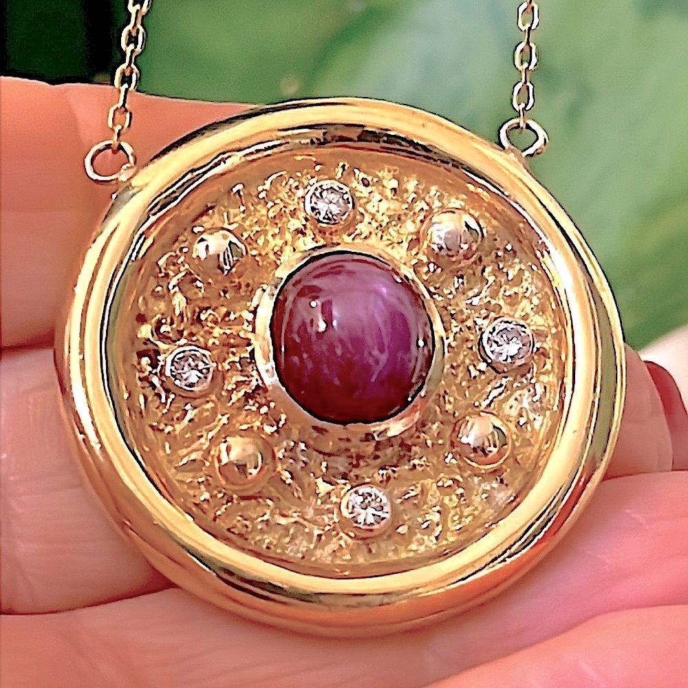 18 karat gold, diamond and star Ruby necklace
